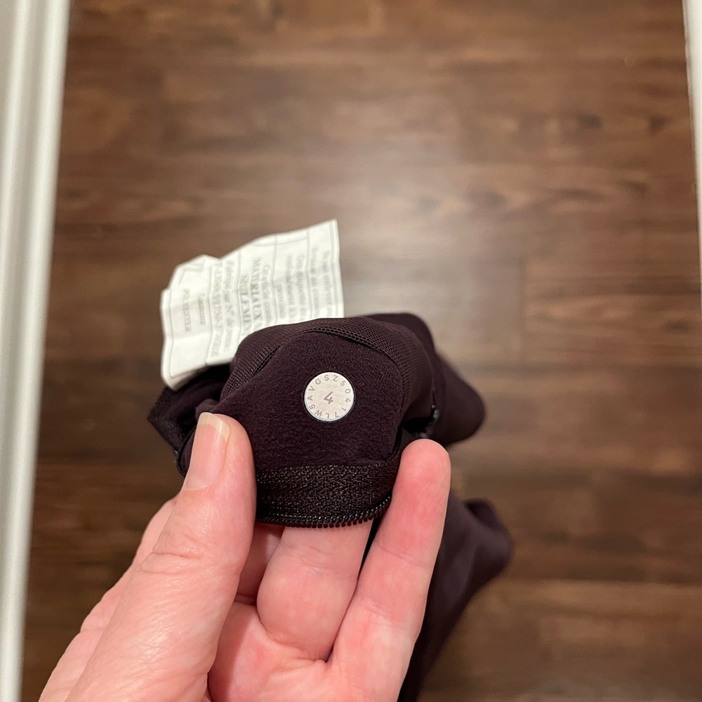 Lululemon Fast As Fleece Tight
Black Cherry Womens Size 4
Reflective Pocket - Picture 11 of 14